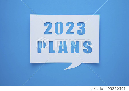 2023 plans text design with letter cutouts . Concept of business plans and goals and strategies 93220501