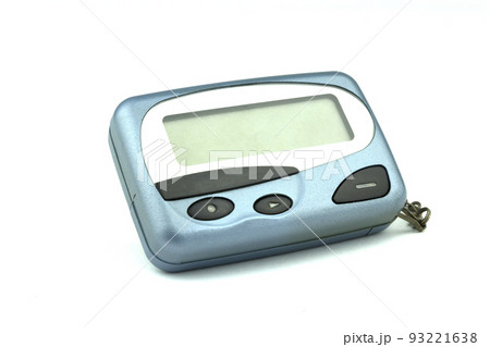 Close-up old a cyan metallic pager or beeper isolated with clipping path on white background. Close-up old a cyan metallic pager or beeper isolated with clipping path on white background. 93221638