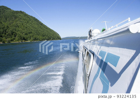 rainbow on the water from the spray boats water transport ship on the route Irkutsk Listvyanka tourism in Russia Siberia 93224135
