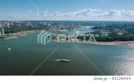 Scenic aerial view of Cheboksary, capital city of Chuvashia, Russia and a port on the Volga River on sunny summer day. English translation of the inscription Cheboksary - the city of river cruise 93226454