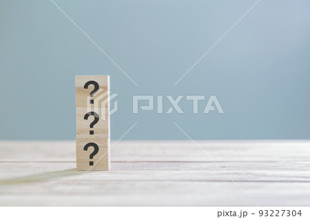 Wooden cube block with sign question mark symbol on wood table with with copy space Wooden cube block with sign question mark symbol on wood table with with copy space 93227304