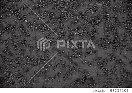 Perfect black asphalt close-up. The texture of black asphalt in England 93232101