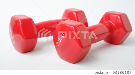Sport equipment. Two red dumbbells for fitness weighing 2 kg on a white background. Sport equipment. Two red dumbbells for fitness weighing 2 kg on a white background. 93236107