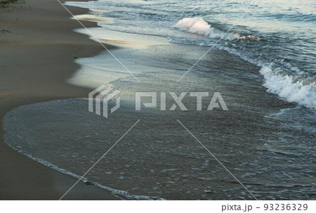 Clear sea water, wave and sand beach. Text space. Clear sea water, wave and sand beach. Text space. 93236329