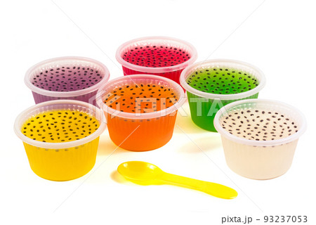 Colorful of homemade fruit gelatin mixed grain seeds in plastic cups with spoon isolated on white background with clipping path. Colorful of homemade fruit gelatin mixed grain seeds in plastic cups with spoon isolated on white background with clipping path. 93237053