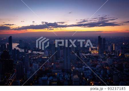 Beautiful twilight and cityscape on highest rooftop building at Bangkok in Thailand. Beautiful twilight and cityscape on highest rooftop building at Bangkok in Thailand. 93237185