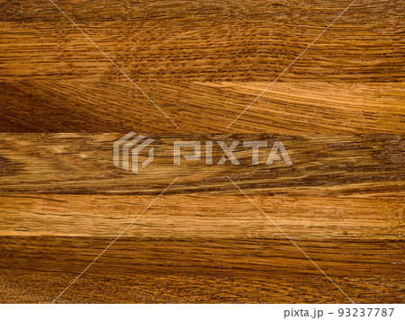 Brown Beige Texture of stained oak wood with grain, fragment of a wooden panel hardwood. surface bark is used as natural background, web page, board, table. Contrasts and symmetries. Space for text. Brown Beige Texture of stained oak wood with grain, fragment of a wooden panel hardwood. surface bark is used as natural background, web page, board, table. Contrasts and symmetries. Space for text. 93237787