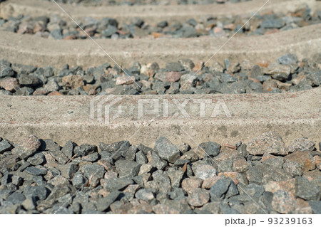 sleepers on rails and gray pebbles between them sleepers on rails and gray pebbles between them 93239163