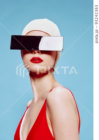 Censored content. Stylish girl in a red swimsuit on a blue background 93242363