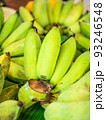 green banana on the table 93246548