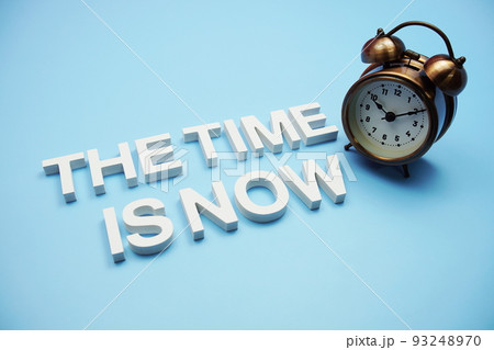 The Time is Now alphabet letters on blue background The Time is Now alphabet letters on blue background 93248970