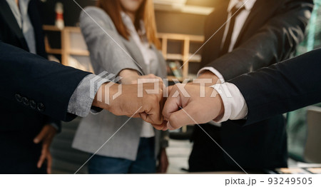 Business handshake closing a deal with blur background of people 93249505