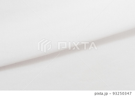 Macro Photo of white fabric texture background. Pattern of white woven clothing material. Macro Photo of white fabric texture background. Pattern of white woven clothing material. 93250347