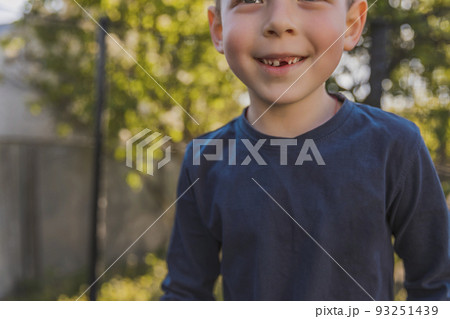 boy jumping on a trampoline boy jumping on a trampoline 93251439