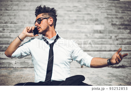 Depressed unsuccessful businessman feels terrible headache, hands shocked by bankruptcy stock downfall sitting on stone stairs. Stressed tired man feels despair lost money online or got problem debt. Depressed unsuccessful businessman feels terrible headache, hands shocked by bankruptcy stock downfall sitting on stone stairs. Stressed tired man feels despair lost money online or got problem debt. 93252853