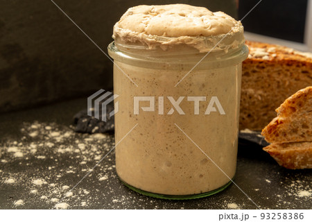 Sourdough homemade rye starter in glass 93258386