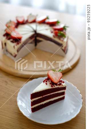 pieces of red velvet cake,tree layer with cream cheese frosting on white dish.Homemade bakery concept. pieces of red velvet cake,tree layer with cream cheese frosting on white dish.Homemade bakery concept. 93259225