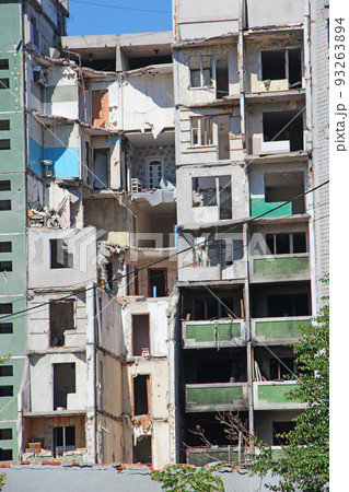 multi-storey building in Chernihiv where rocket hit. dilapidated apartment building 93263894