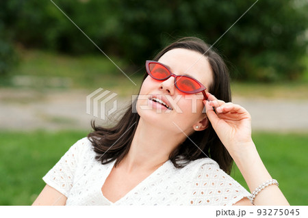 Woman portrait outdoors 93275045