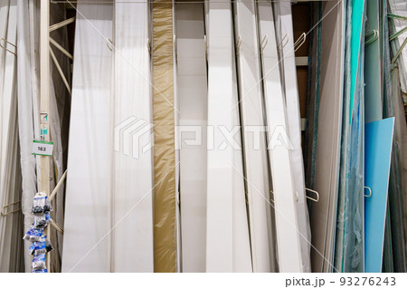 window sills and tides for windows on the rack in the hardware store. 93276243