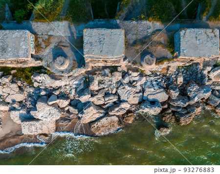 Ruins of bunkers on the beach of the Baltic sea, part of an old fort Ruins of bunkers on the beach of the Baltic sea, part of an old fort 93276883