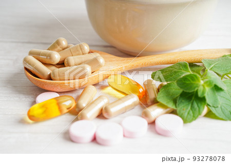 Alternative medicine herbal organic capsule with vitamin E omega 3 fish oil, mineral, drug with herbs leaf natural supplements for healthy good life. 93278078