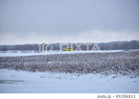 Yellow bus rides and snow-covered fields. Yellow bus rides and snow-covered fields. 93286813