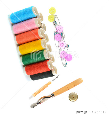 A set of threads, buttons and other sewing accessories isolated on a white background. Collage. Free space for text. A set of threads, buttons and other sewing accessories isolated on a white background. Collage. Free space for text. 93286840