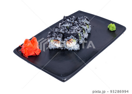 Japanese seafood Sushi roll isolated on white close up. Japanese food restaurant, sushi maki gunkan roll plate or platter set. Maki Sushi rolls with salmon and avocado. Sushi isolated at white 93286994