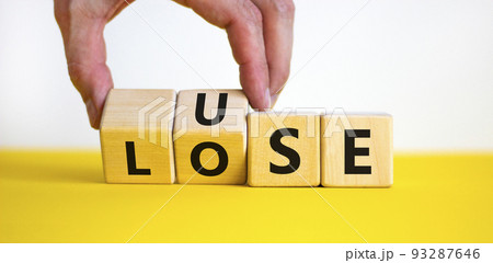 Use or lose symbol. Concept words Use or lose on wooden cubes. Businessman hand. Beautiful yellow table white background. Business Use or lose concept. Copy space. Use or lose symbol. Concept words Use or lose on wooden cubes. Businessman hand. Beautiful yellow table white background. Business Use or lose concept. Copy space. 93287646