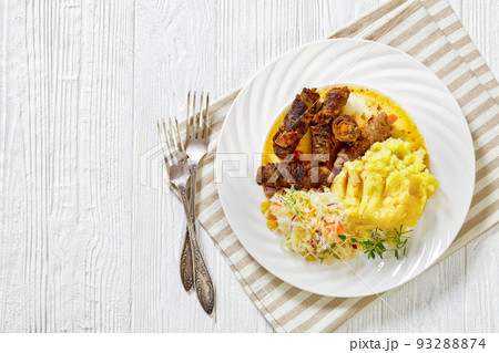 beef rouladen with potato mash and sauerkraut beef rouladen with potato mash and sauerkraut 93288874