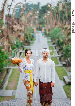 balinese people wearing traditional clothing in penglipuran village 93292398