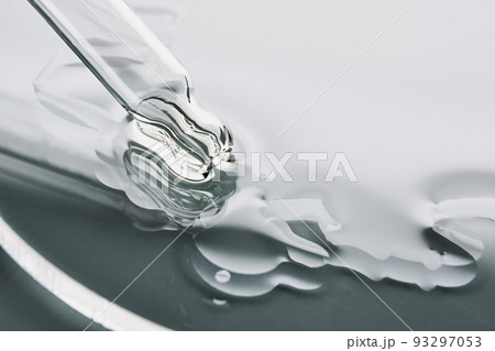 Pipette with sample of cosmetic product in petri dish on grey background, selective focus Pipette with sample of cosmetic product in petri dish on grey background, selective focus 93297053