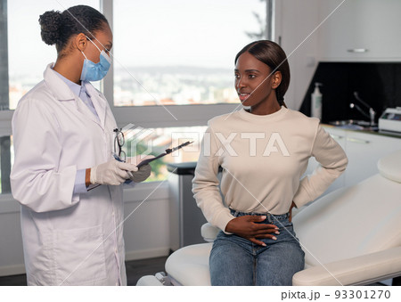 African American woman at doctors appointment African American woman at doctors appointment 93301270