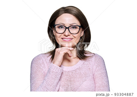 Attractive middle aged woman looking at camera on white isolated background Attractive middle aged woman looking at camera on white isolated background 93304887