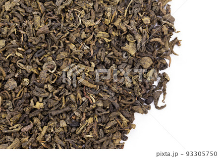 Dried green tea leafs background. Dried green tea leafs background. 93305750