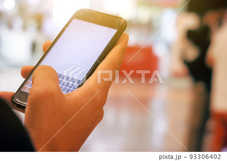 man checking his phone 93306402