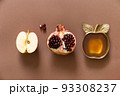 Rosh hashanah concept - honey, pomegranate and apples 93308237