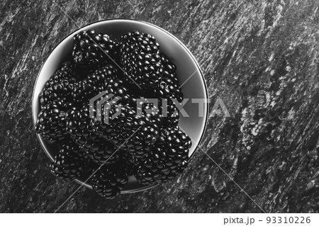 Blackberry berries. Black berries close-up on a wooden surface. Copyspace. Blackberry berries. Black berries close-up on a wooden surface. Copyspace. 93310226