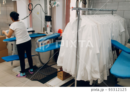 Dry cleaning shirts clothes. Clean cloth chemical process. Laundry industrial dry-cleaning. 93312125