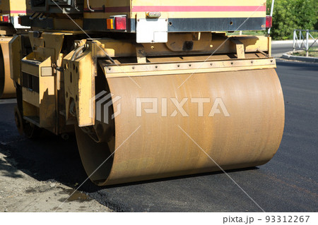Equipment for the repair of the roadway, asphalt paver - skating rink on the street of the city 93312267