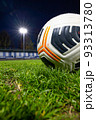 soccer ball on the lawn. football stadium at night. soccer ball on the lawn. football stadium at night. 93313780