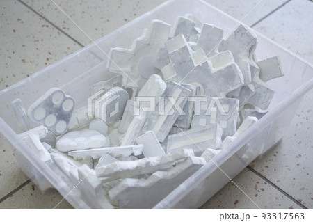 Detail objects printed on powder 3D printer and covered white polyamide powder close-up. Technology Multi Jet Fusion MJF. 3D prototype models created by new additive progressive 3d printing technology 93317563