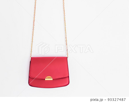 Coral fashionable leather purse with gold details as designer bag and stylish accessory, female fashion and luxury style handbag collection concept Coral fashionable leather purse with gold details as designer bag and stylish accessory, female fashion and luxury style handbag collection concept 93327487