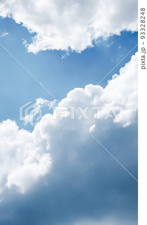 Sunny blue cloudy sky as abstract background, beauty in nature design concept 93328248