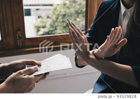 Lawyer Rejecting offer of black money in exchange for a permit in the deal. Concepts of corruption and anti bribery 93329828