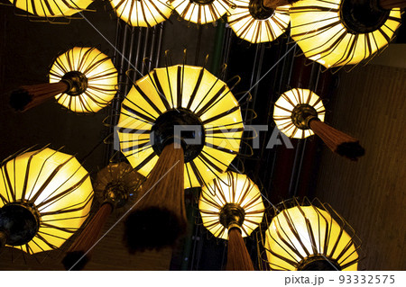 Looking up at a chandelier Looking up at a chandelier 93332575