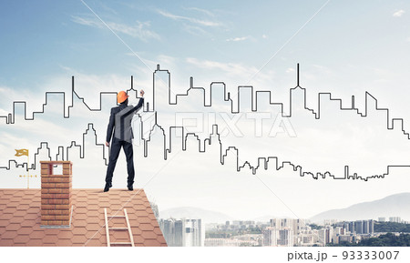 Man architect draw silhouette of modern city on blue sky. Mixed Man architect draw silhouette of modern city on blue sky. Mixed 93333007