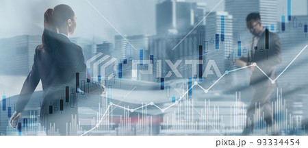 Trading candlestick chart and diagrams on blurred office center background people Trading candlestick chart and diagrams on blurred office center background people 93334454