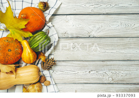 Pumpkin on old rustic wooden table. 93337093